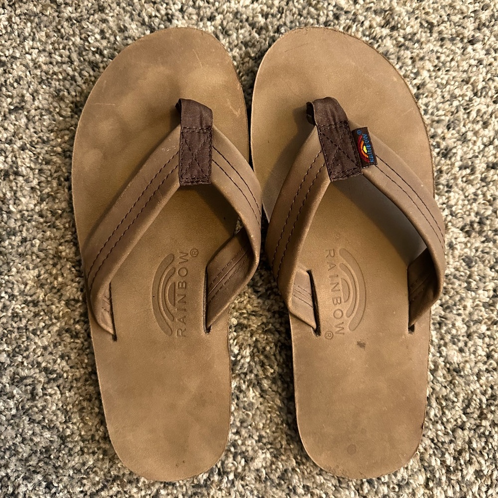 Rainbow single layer flip flops.